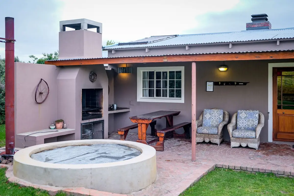 A hot tub on a backyard patio