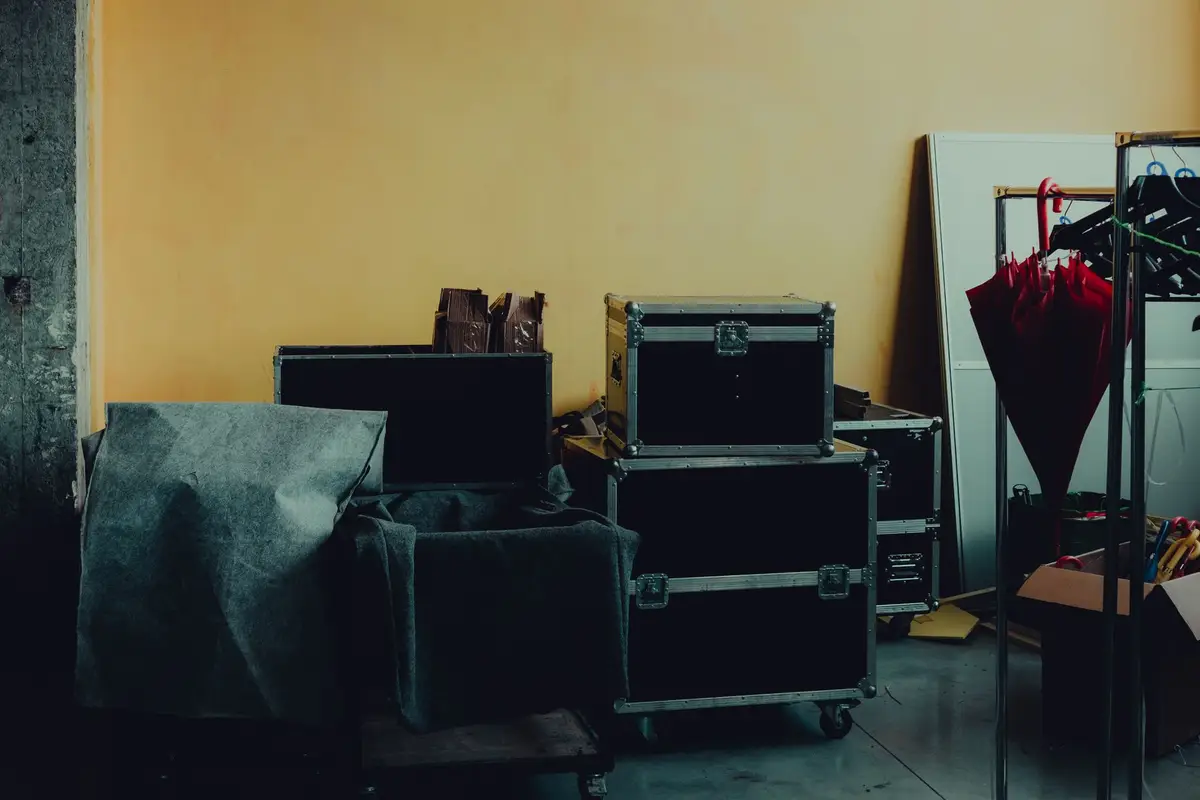 A room crowded with boxes and stored items